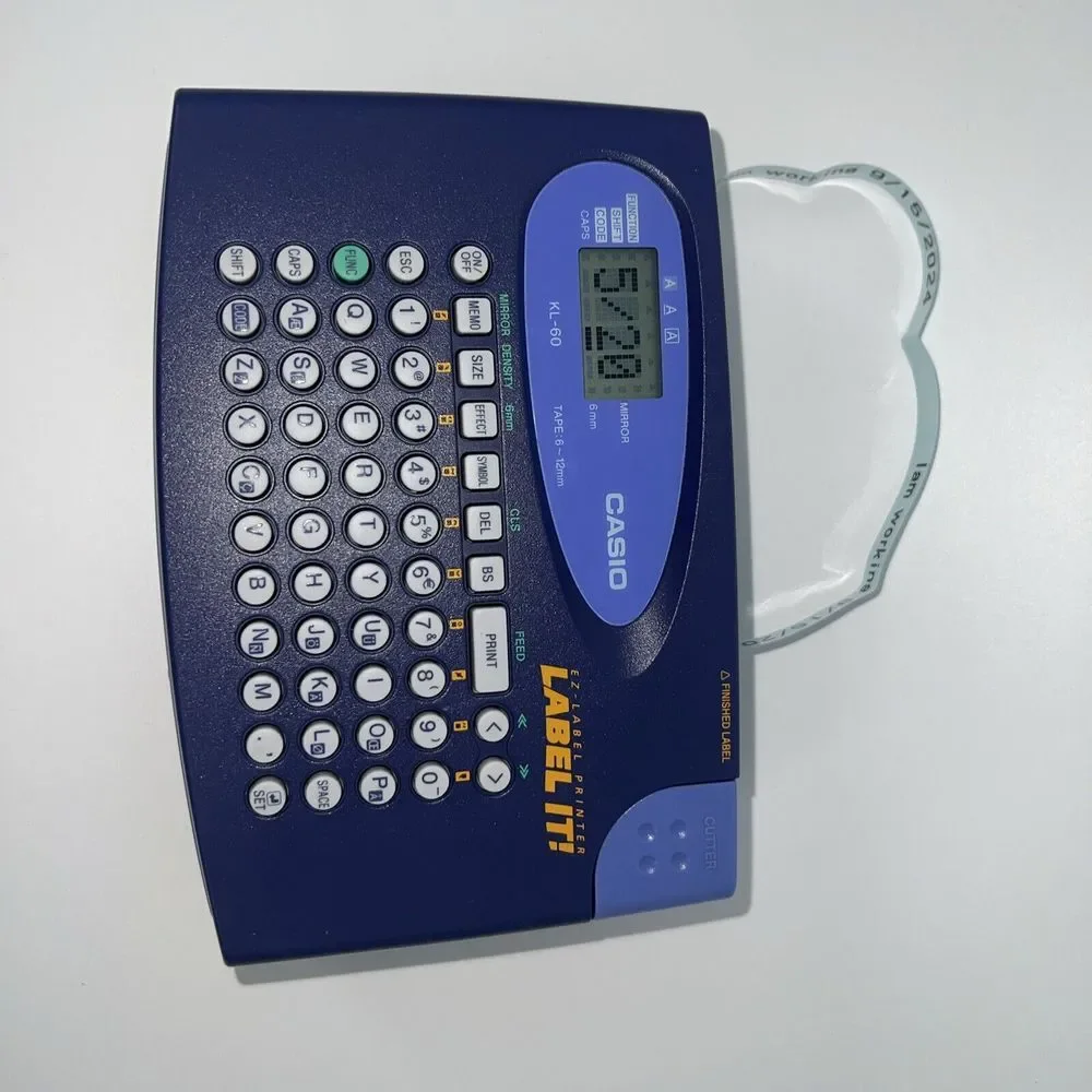 Casio LABEL IT! EZ-Label Printer Model # KL-60-L A Clear Tape Included Inside De